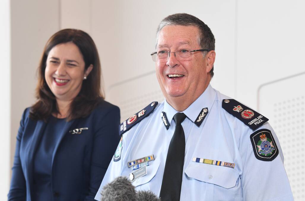 Queensland Premier Annastacia Palaszczuk (left) is seen with Queensland Police Commissioner Ian Stewart at a press conference to announce his retirement. Photo: AAP/Dave Hunt
