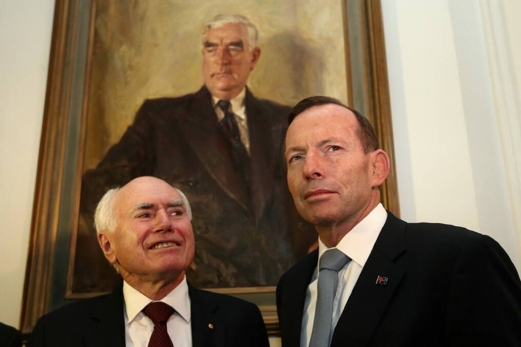 John Howard and Tony Abbott watched over by Menzies' portrait in 2014. Neither trusted the APS, seeking instead to change its culture and to rely on outsiders. Photo: Alex Ellinghausen