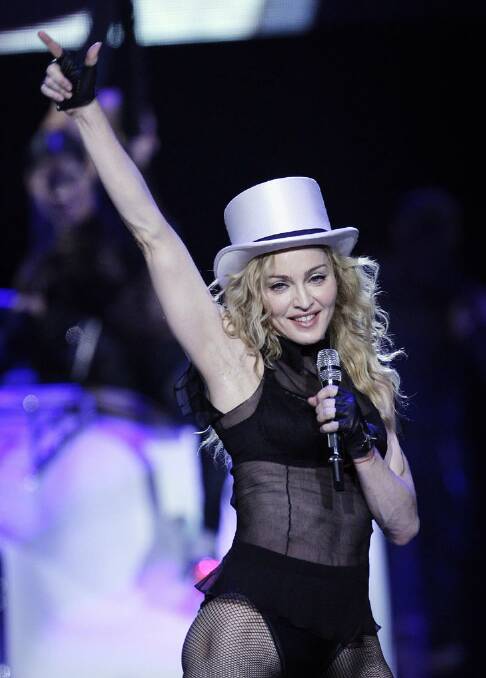 Madonna is returning to the studio to teach the new wave of female singers how to really belt out a song. Photo: AP
