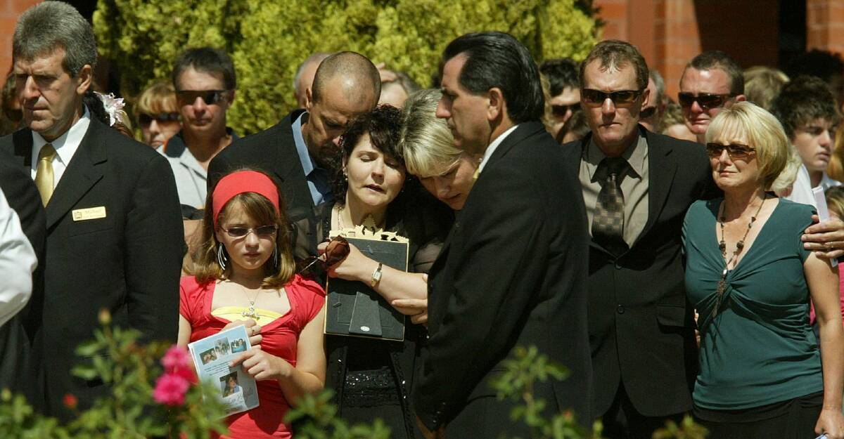 Stevie-Lee Weight's younger sister Monica-Rose pictured at her funeral in Mildura with her parents, Stephen and Jennie-May. Photo: Kate Geraghty