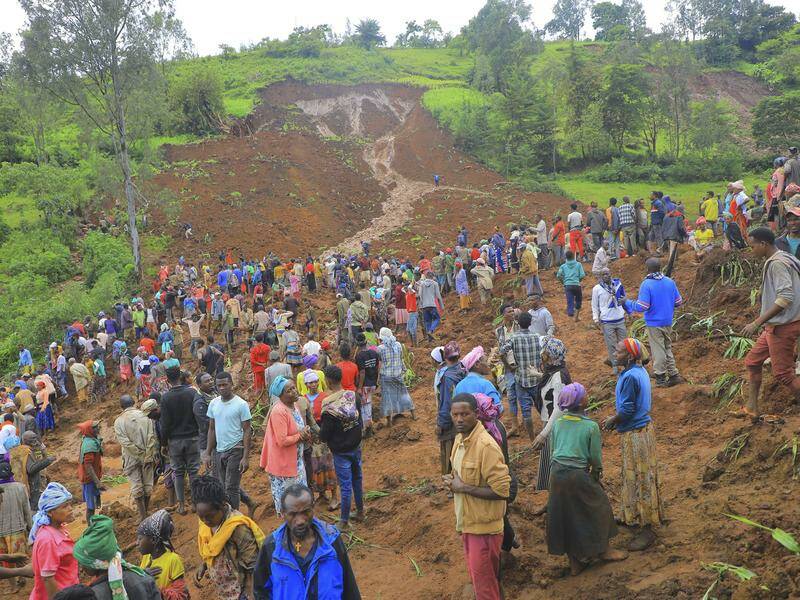 The death toll rose from 55 as search operations continued following two mudslides in Ethiopia. Photo: AP PHOTO