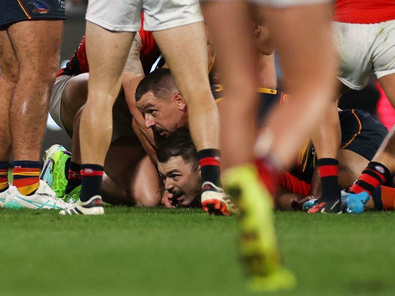 Essendon's Sam Draper in the controversial last-second tackle against the Crows in round six. Photo: Matt Turner/AAP PHOTOS