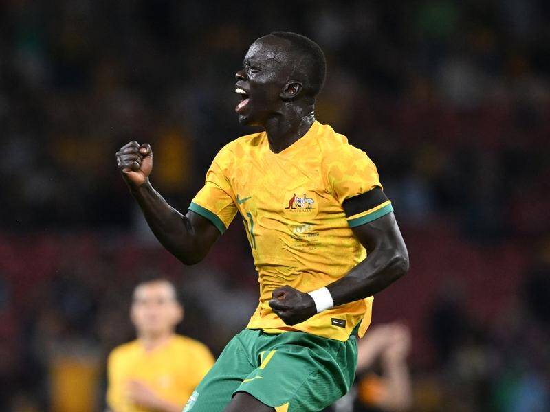 Awer Mabil celebrates scoring a spectacular goal in the Socceroos' victory over New Zealand. (Dave Hunt/AAP PHOTOS)