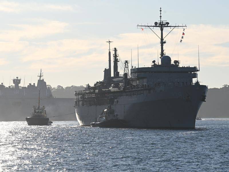 The USS Emory S Land has arrived in Sydney, enabling Australian sailors on board to visit family. (Dean Lewins/AAP PHOTOS)