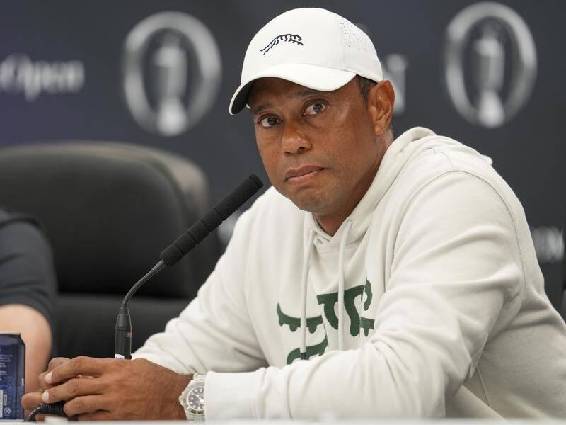 Tiger Woods was clearly unhappy with Colin Montgomerie's comments he should quit the game. (AP PHOTO)