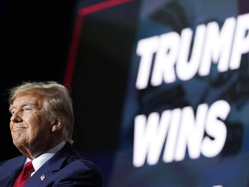 Donald Trump has won the Iowa Republican presidential contest by an unprecedented margin. (AP PHOTO)