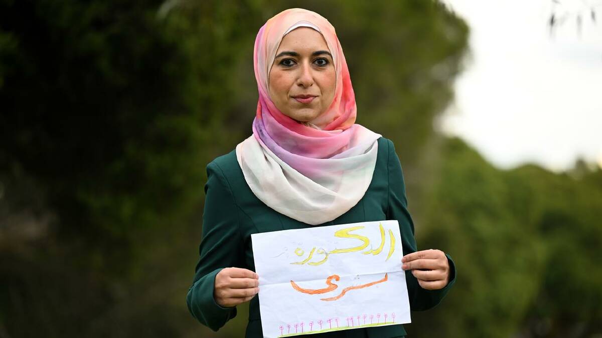 Bushra Othman was given a drawing by Mohamed, a 10-year-old Palestinian child in Gaza (James Ross/AAP PHOTOS)