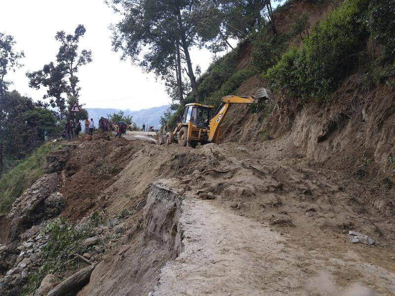 At least 35 people have died in landslides, floods and lightning strikes in Nepal since mid-June. (AP PHOTO)