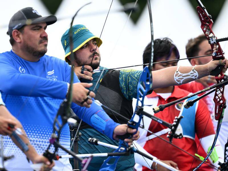 Australia's Peter Boukouvalas struggled to master adverse conditions at the archery event in Paris. Photo: Joel Carrett/AAP PHOTOS
