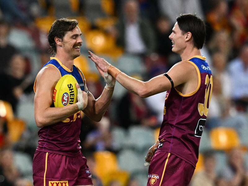 Either Joe Daniher (l) or Eric Hipwood (r) could play in defence for Brisbane against Gold Coast. Photo: Darren England/AAP PHOTOS