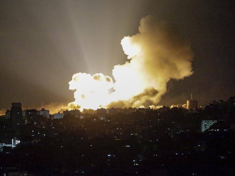 Israel says dozens of its fighter jets struck more than 200 targets overnight in Gaza City. (EPA PHOTO)