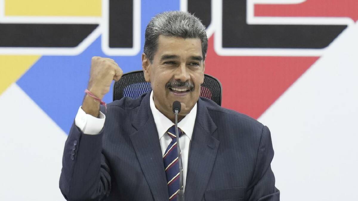 President Nicolas Maduro warned that Venezuela's "law will be respected" as he claimed victory. (AP PHOTO)