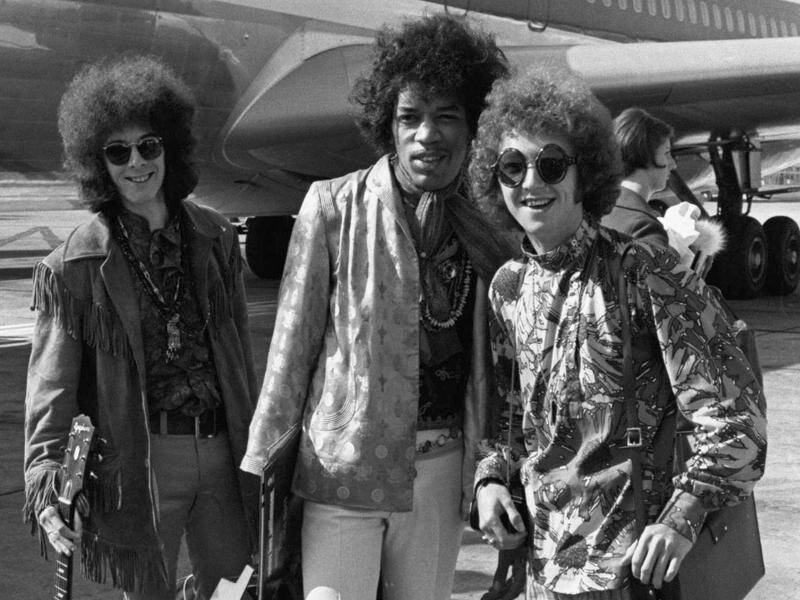 Noel Redding (left), Jimi Hendrix and Mitch Mitchell all signed the lyrics given away 55 years ago.