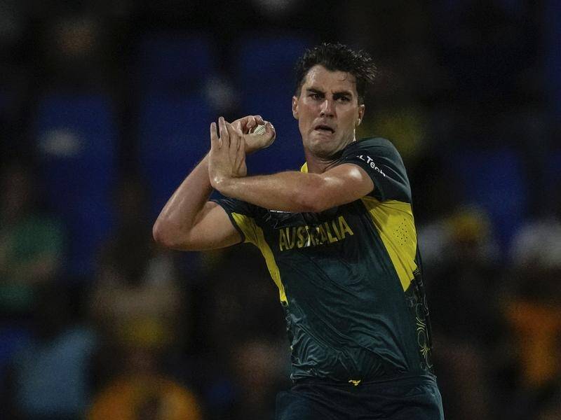 Pat Cummins has claimed back-to-back hat-tricks at the T20 World Cup. (AP PHOTO)