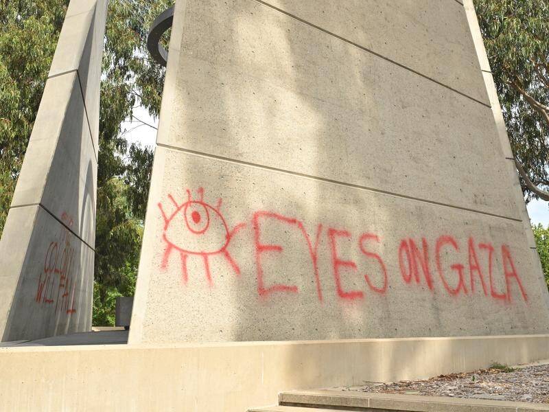 A Vietnam war memorial in Canberra has been vandalised with graffiti urging 'eyes on Gaza'. (Mick Tsikas/AAP PHOTOS)