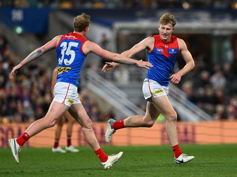 Melbourne's makeshift ruck options Jacob van Rooyen (right) and Harrison Petty were outclassed. Photo: Darren England/AAP PHOTOS