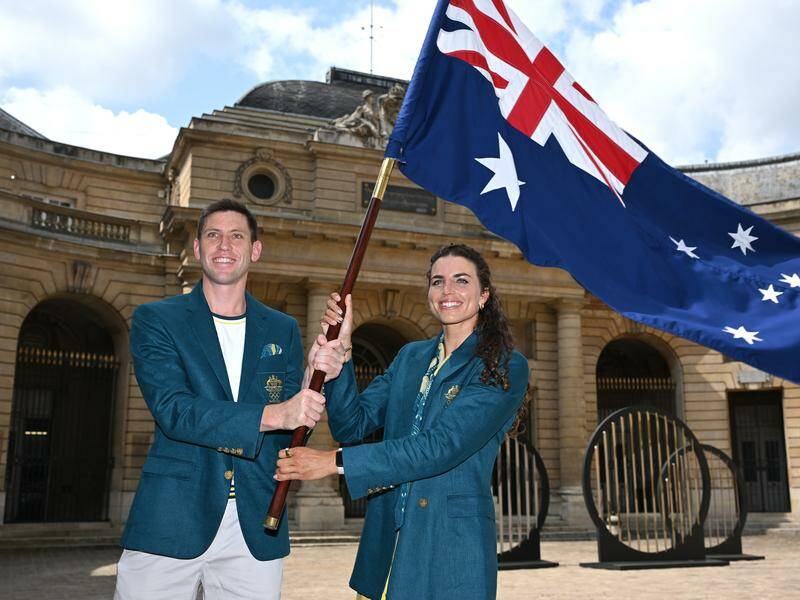 Jessica Fox and Eddie Ockenden will carry the Australian flag at the opening ceremony in Paris. Photo: Dave Hunt/AAP PHOTOS