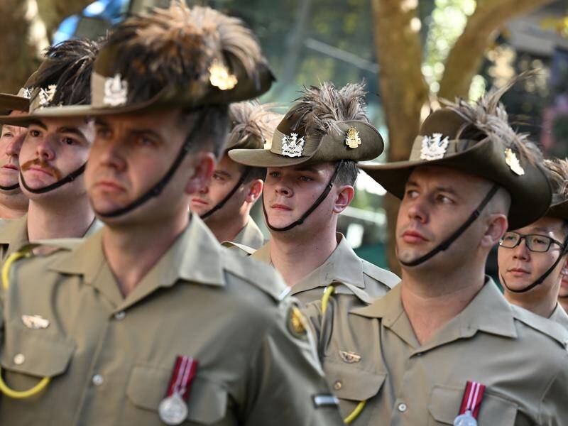 Stores in NSW will remain closed all of Anzac Day from 2025, instead of being able to open at 1pm. (Dean Lewins/AAP PHOTOS)
