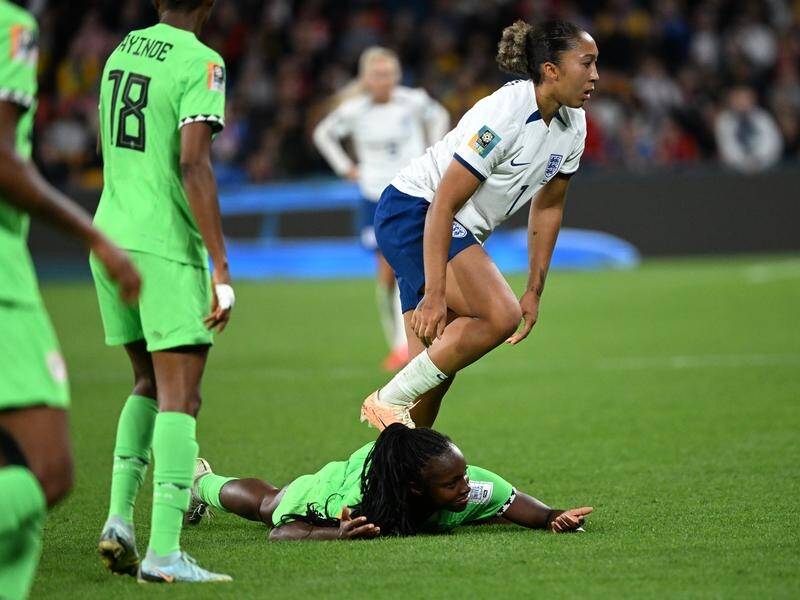 England's Lauren James steps on the back of Nigeria's Michelle Alozie during their last-16 clash. (Darren England/AAP PHOTOS)