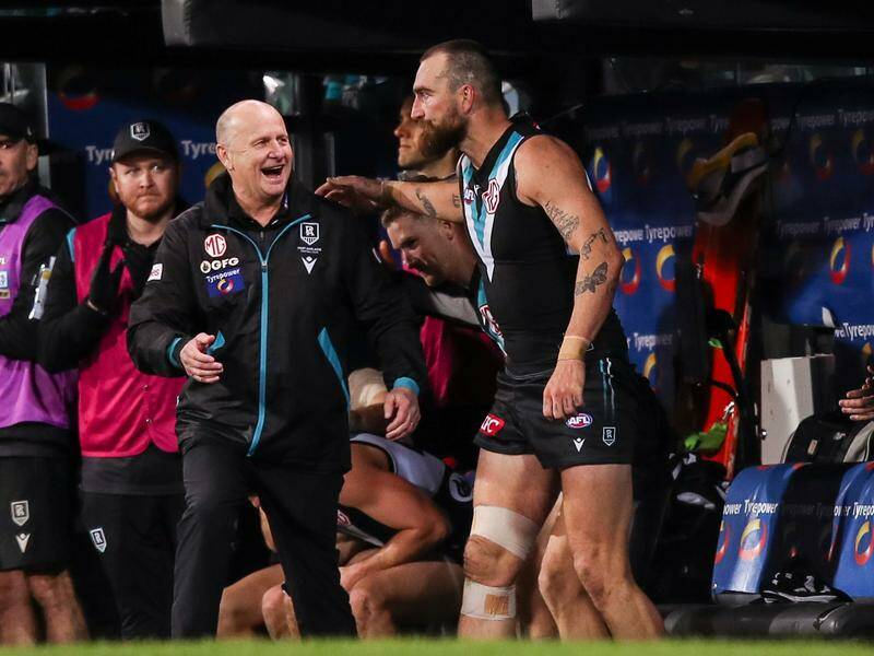 Power coach Ken Hinkley with Charlie Dixon, who he recently challenged to fight for his team place. Photo: Matt Turner/AAP PHOTOS