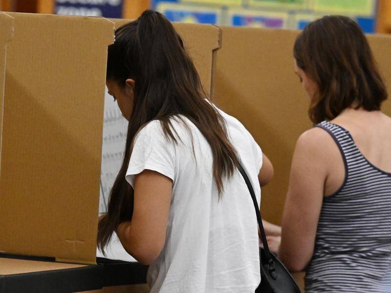 The estimated national enrolment rate has risen to 97.5 per cent, the electoral commission says. (Dean Lewins/AAP PHOTOS)