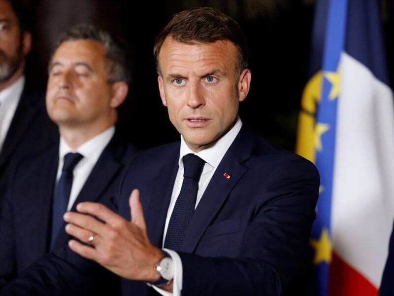 President Emmanuel Macron says French police will stay in New Caledonia "as long as necessary". (AP PHOTO)