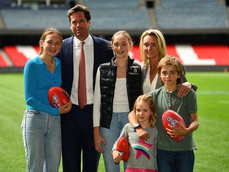 Gillon McLachlan, wife Laura and their children after announcing he would leave his AFL post.