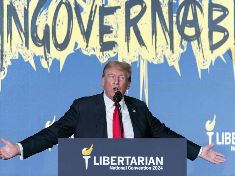 Donald Trump reacts during his address at the Libertarian National Convention in Washington. (AP PHOTO)