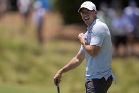 Rory McIlroy enjoyed a laugh during his Tuesday practice round ahead of the US Open. (AP PHOTO)