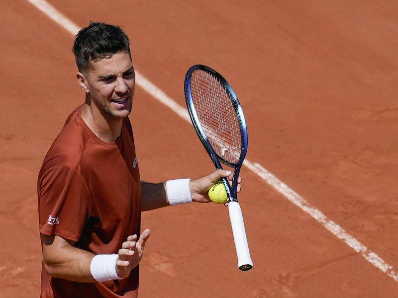 Thanasi Kokkinakis has won a classic from two sets down to make the third round at the French Open. (AP PHOTO)