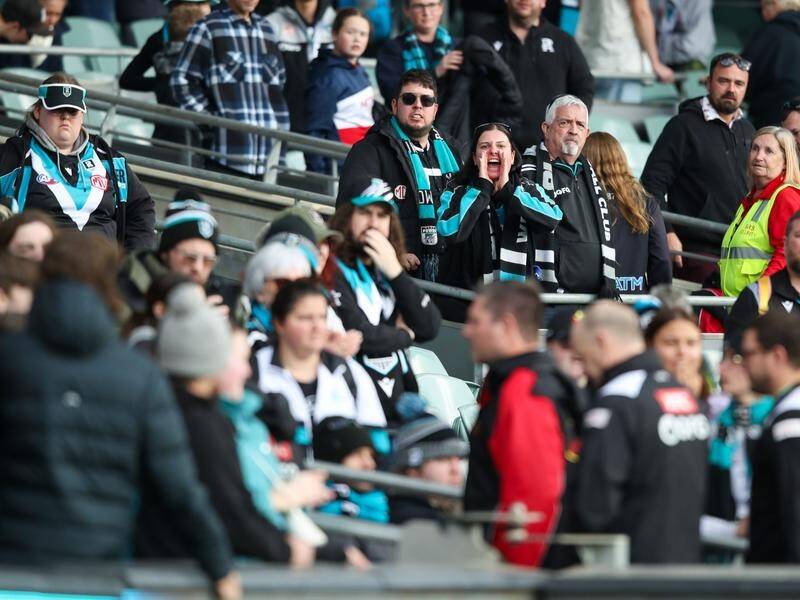 Port fans give head coach Ken Hinkley some advice as he leaves the field after the Brisbane loss. (Matt Turner/AAP PHOTOS)