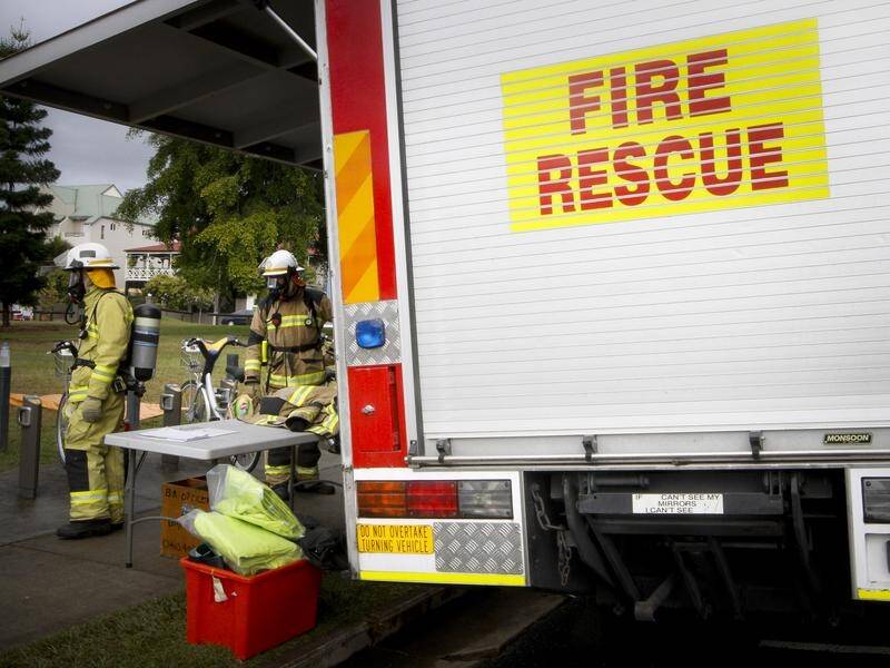 Fire crews have rescued a Sydney family after they almost succumbed to carbon monoxide poisoning. (Patrick Hamilton/AAP PHOTOS)