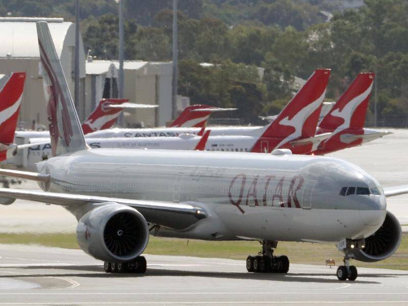 A political row continues over the government denying Qatar Airways more Australian flights. (Richard Wainwright/AAP PHOTOS)