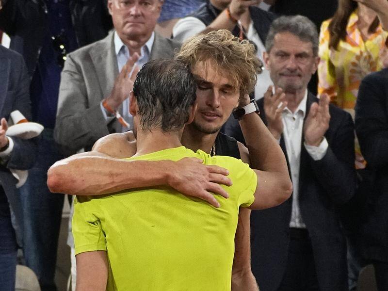 Alexander Zverev (R) hugging Rafael Nadal after their last ill-fated match at Roland Garros. (AP PHOTO)