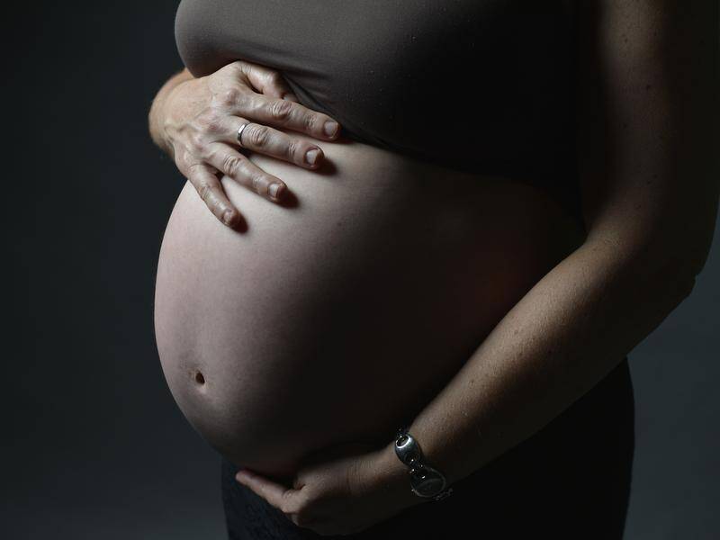 A study says women who suffered childhood trauma are more at risk of complications during pregnancy. (Tracey Nearmy/AAP PHOTOS)