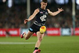 Star onballer Sam Walsh and his Carlton teammates face a big test against Geelong on Friday night. (Rob Prezioso/AAP PHOTOS)