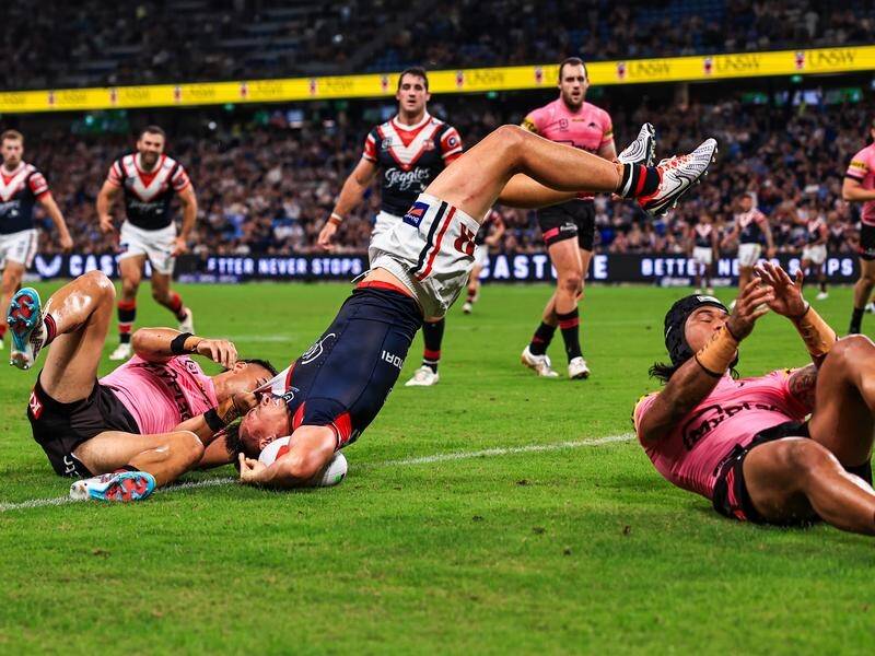 Joey Manu's acrobatic effort for the Roosters was wrongly chalked off over an earlier obstruction. (Mark Evans/AAP PHOTOS)