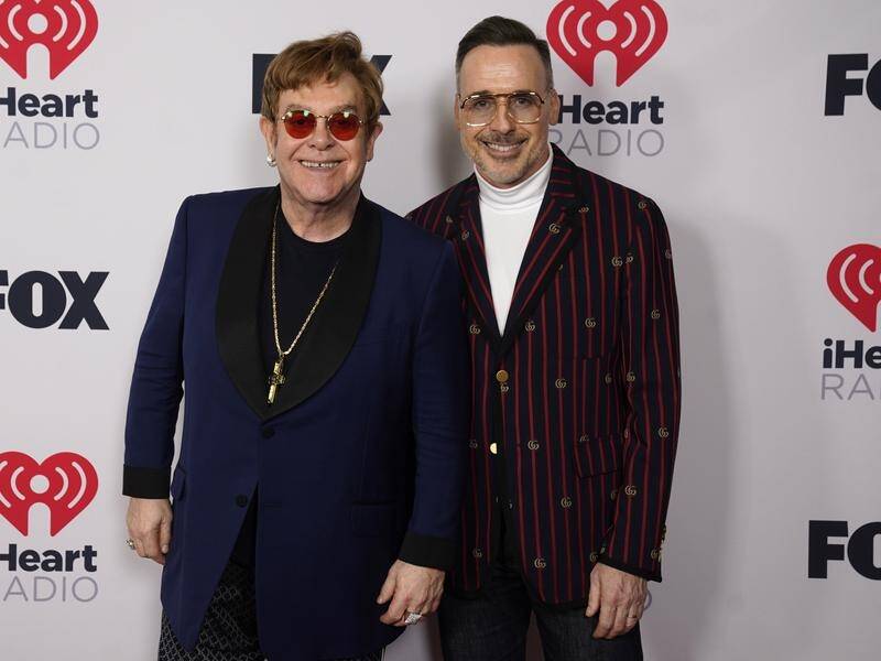 Photos from the collection of Elton John and David Furnish will be shown in London next year. (AP PHOTO)