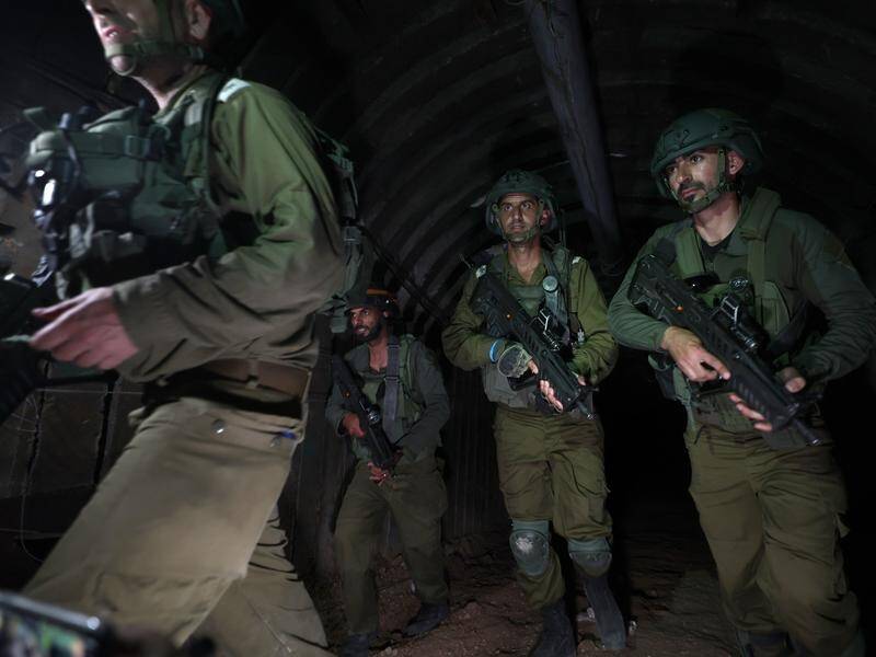 The Israeli army says its troops have found weapons and a tunnel used by Hamas militants. (EPA PHOTO)