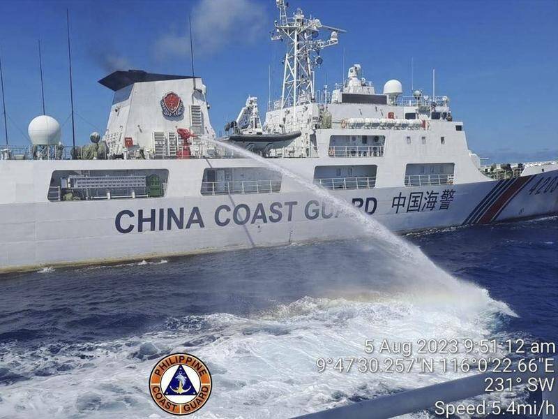 Philippine navy personnel and the Chinese coast guard have clashed in the South China Sea. (AP PHOTO)