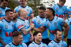 All smiles now but recent Origin deciders in Queensland have not ended well for the NSW Blues. (Thomas Parrish/AAP PHOTOS)
