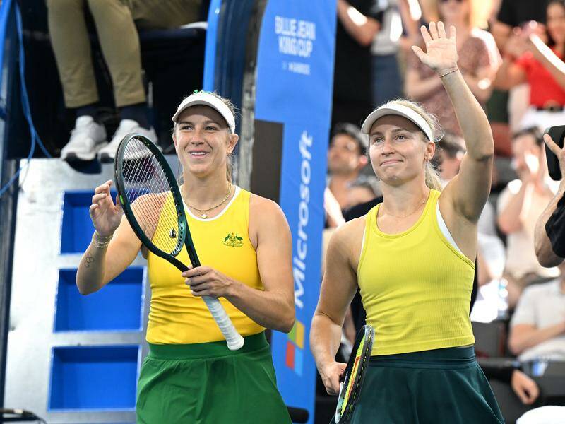 Daria Saville (R) has spurned the singles to focus on her doubles medal bid with Ellen Perez (L). Photo: Darren England/AAP PHOTOS