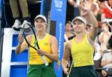 Daria Saville (R) has spurned the singles to focus on her doubles medal bid with Ellen Perez (L). Photo: Darren England/AAP PHOTOS