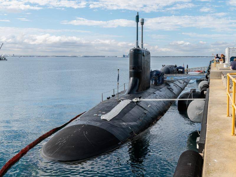 New laws and a new regulator will protect Australia's path to acquire nuclear-powered submarines. (Richard Wainwright/AAP PHOTOS)