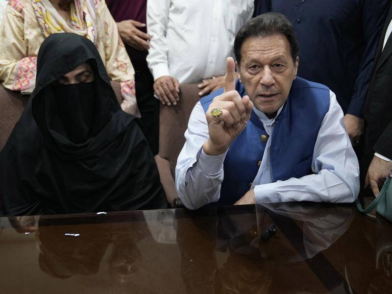 Imran Khan and his wife Bushra Bibi pleaded not guilty to the new accusations of graft. (AP PHOTO)