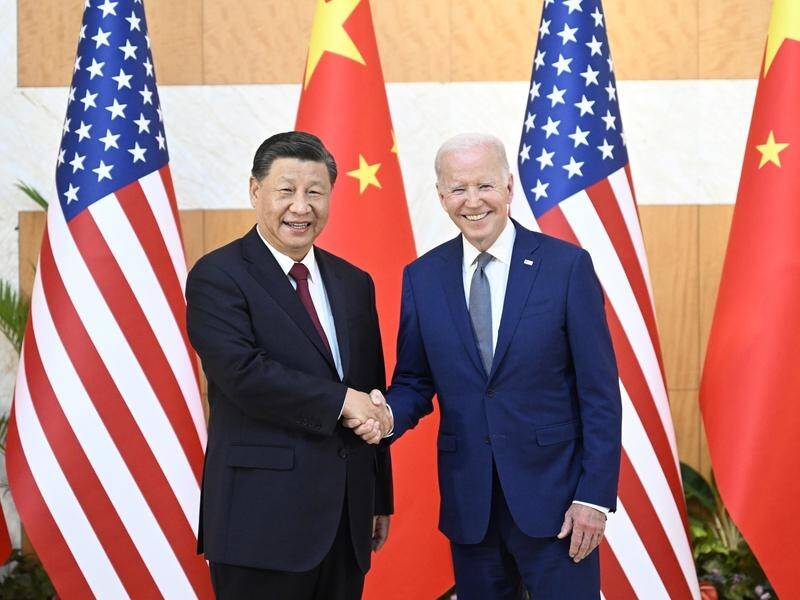 Chinese President Xi Jinping and US counterpart Joe Biden discussed climate talks at the G20. (EPA PHOTO)