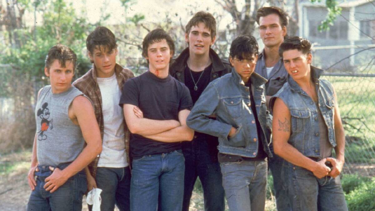 Rob Lowe (second from left) and Tom Cruise (right) were teenagers when they filmed The Outsiders. (AP PHOTO)