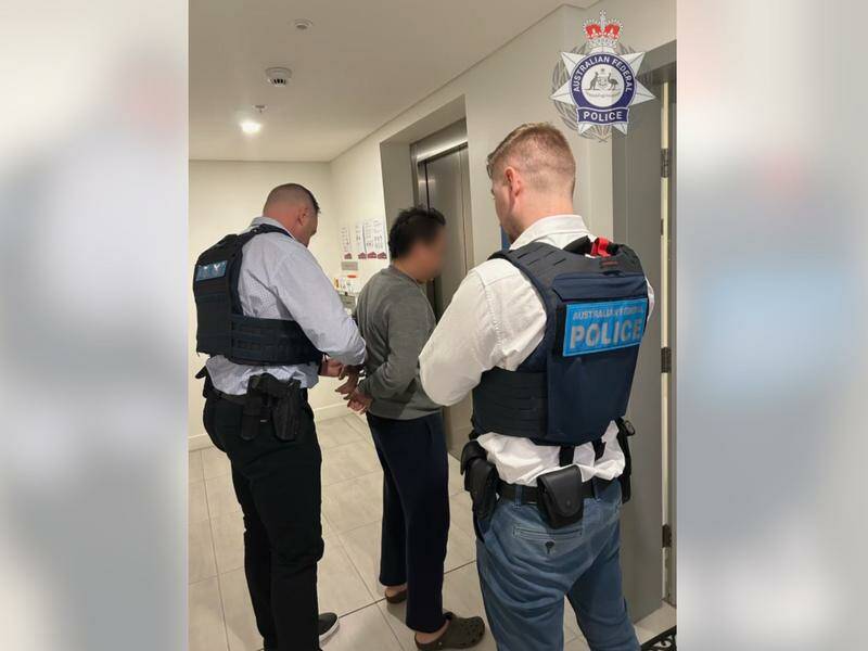 A Sydney man has been arrested and charged with one count of trafficking in children. Photo: HANDOUT/AUSTRALIAN FEDERAL POLICE