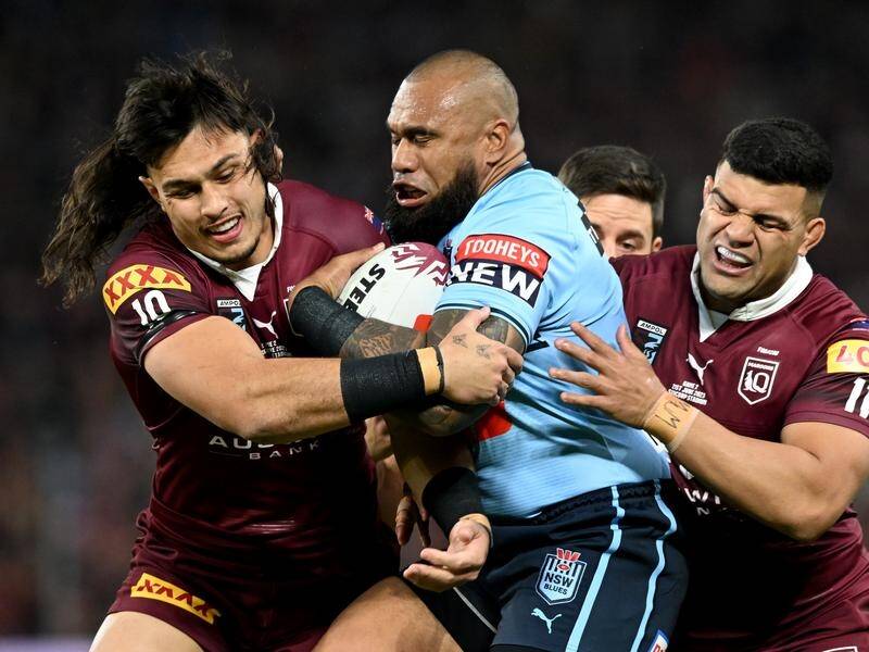 The Titans are confident Maroons duo Tino Fa'asuamaleaui (L) and David Fifita (R) will stay in 2024. (Darren England/AAP PHOTOS)