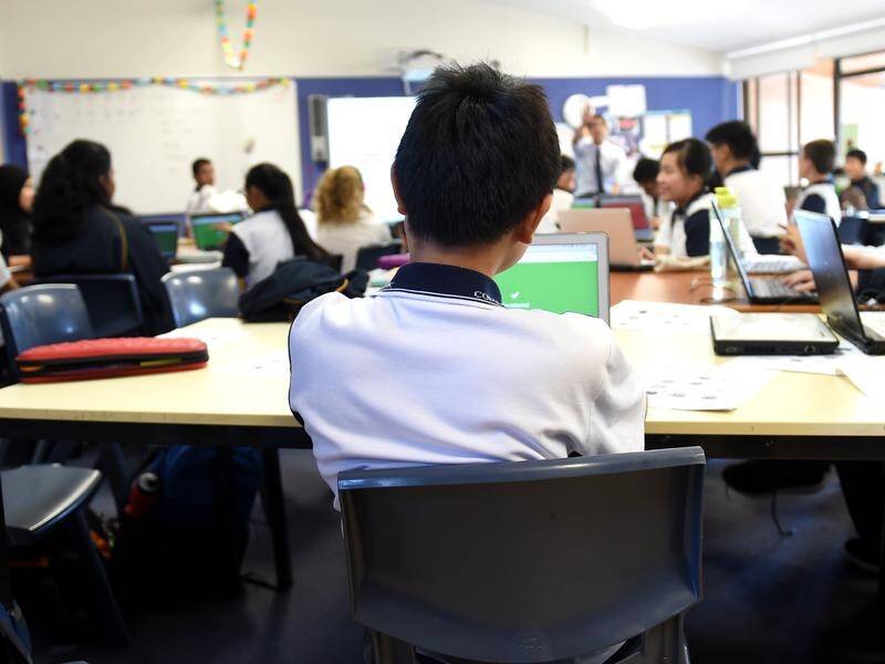 Foreign-qualified teachers represent a missed opportunity for solving shortages, experts say. (Paul Miller/AAP PHOTOS)
